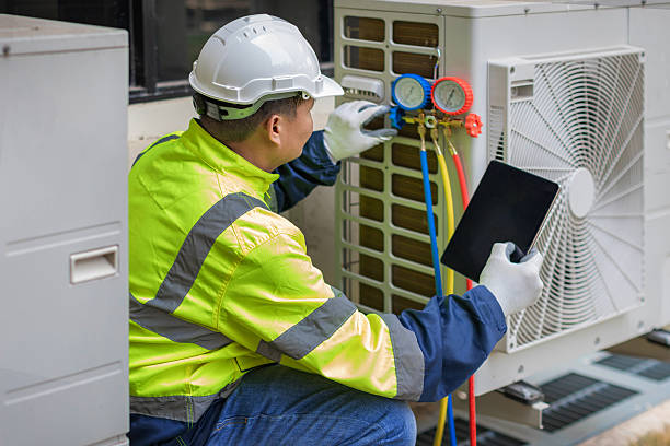 Professional Hvac technician working in Maxton, NC